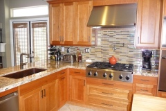Natural-Cherry-kitchen-with-a-drop-in-cooktop